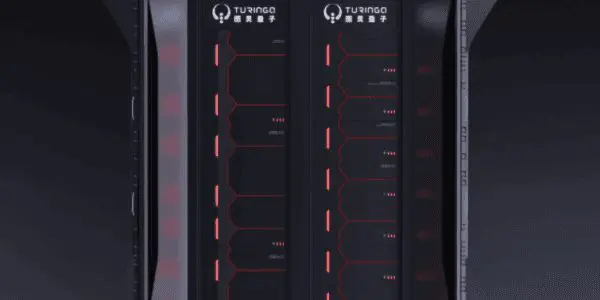 A sleek, futuristic server unit sits on a dark surface, illuminated by red lines and featuring a minimalist design.