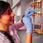 A person working on a quantum computer