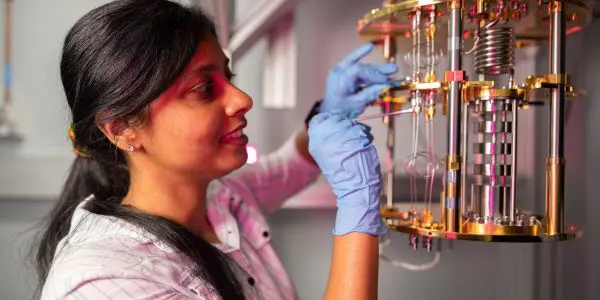 A person working on a quantum computer