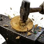 quantum resistant bitcoin, a bitcoin coin struck by a hammer on an anvil