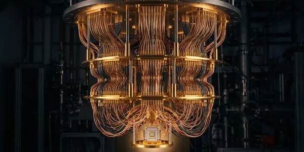 Gold dilution refrigerator stages hung with cascading copper coaxial wiring down to a chip