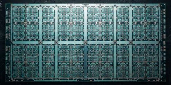 A large AI accelerator die showing rows of identical compute tiles