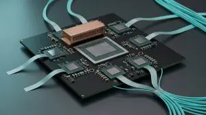 A chip module with teal fibre pigtails on every side