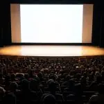A conference auditorium seen from the back of the room