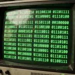 Rows of binary digits on a green screen