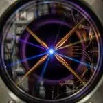 Single ion suspended in an electromagnetic trap