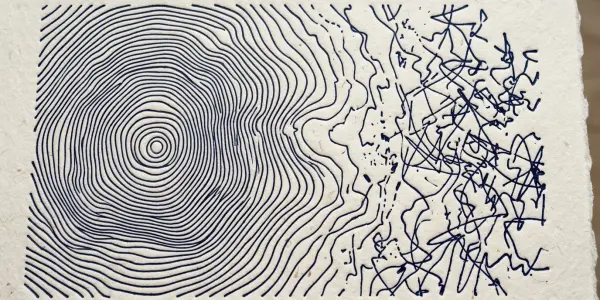 A hand-drawn illustration on textured paper features concentric lines transitioning into chaotic scribbles, primarily in dark blue