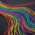 A ribbon cable fanning into individual coloured wires