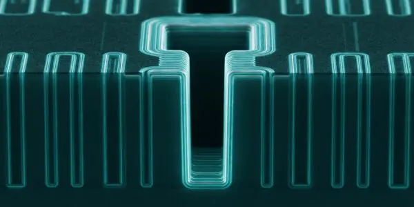 A glowing, teal circuit board with layered metallic pathways is displayed against a dark background