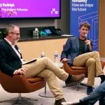 Professor Peter Haynes and Professor Terry Rudolph speaking at an event in San Francisco