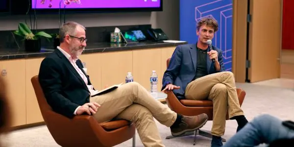 Professor Peter Haynes and Professor Terry Rudolph speaking at an event in San Francisco