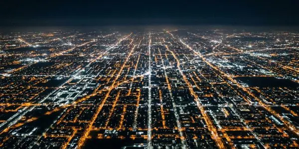 A city grid of lights seen from the air at night