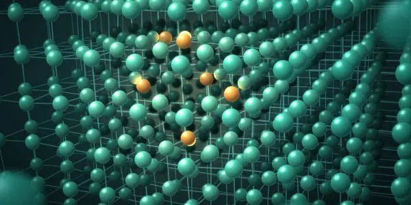 A crystal lattice with a cluster of dopant atoms at its core