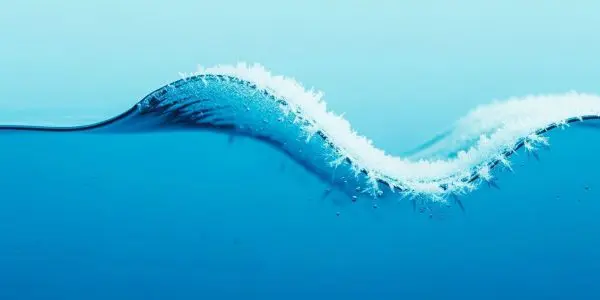 Cryogenic cooling systems reaching near absolute zero temperatures