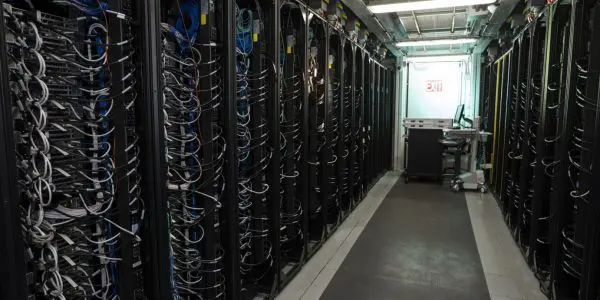 A row of server racks inside the Lincoln Laboratory Supercomputing Center
