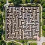 Photonic Reinforcement Learning Beats Dijkstra Routing Algorithm