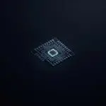 Qubit chip glowing in darkness