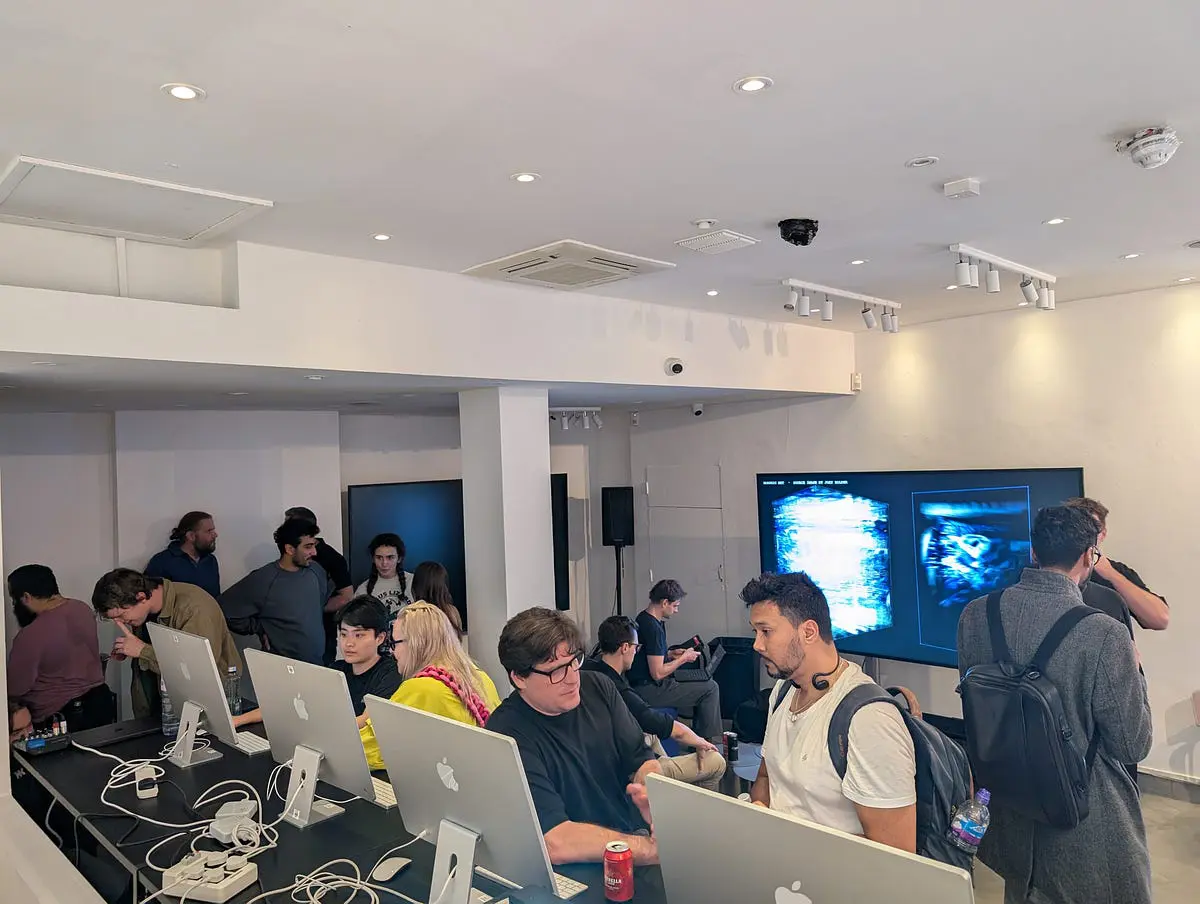 The basement in Soho, where visitors worked on iMacs during the Moth hackathon.