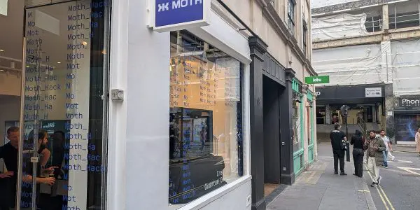 Moth's Soho shopfront at the launch of quantum computers for creatives, with Moth_Hack repeated across the window.