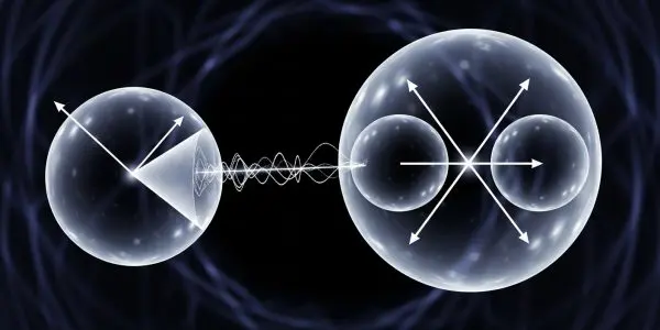 Two glassy spheres marked with spin arrows connected by a wave on a dark field