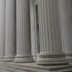 A neoclassical university building facade