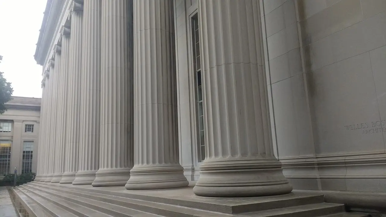 A neoclassical university building facade