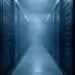 An aisle between two walls of dense server racks