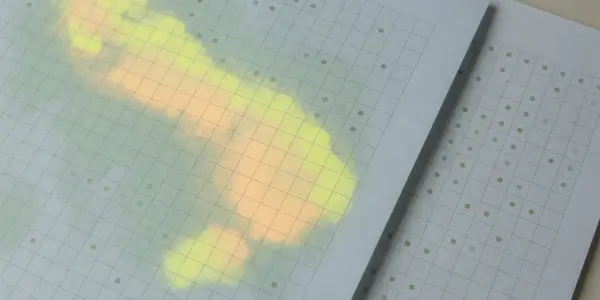A grid of dots is overlaid with a glowing, pastel-coloured neural network visualisation, creating an abstract, digital aesthetic.