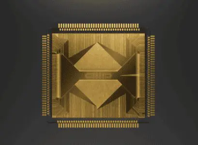 A highly detailed golden computer chip is prominently displayed against a dark grey background, showcasing intricate geometric patterns.