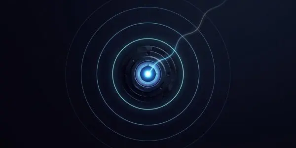 A small metallic device with a bright blue glowing center emits concentric circular rings and a thin filament of light.