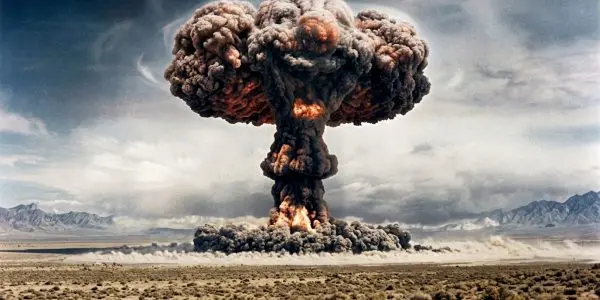 Illustration of a mushroom cloud rising over a desert plain with mountains behind, in the style of a 1940s colour photograph