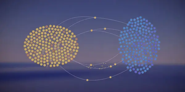Two clusters of glowing spheres are connected by faint lines against a blurred, dark blue and purple gradient background.