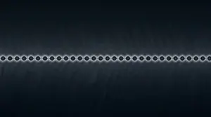 A horizontal row of small, grey beads is displayed against a dark blue background with subtle texture.