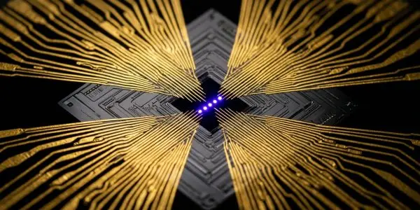 A symmetrical composition of circuit boards and golden traces converges on a central blue LED cross, set against black.
