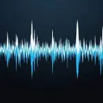 A blue waveform stretches across a dark background, suggesting audio or sound visualization with varying intensity