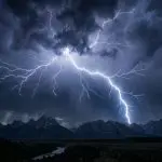 A lightning bolt over a dark ridge