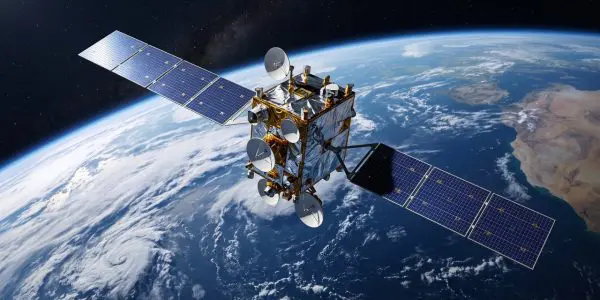 A communications satellite in orbit above the Earth