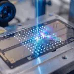 A two-dimensional array of trapped ions on a surface trap