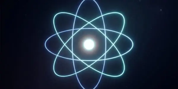 A bright white core surrounded by intersecting glowing blue-green elliptical orbital rings against dark space.
