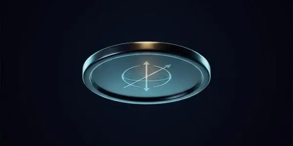 A dark metallic disc floating on a near-black background, its face engraved with a glowing three-axis sphere-and-arrows symbol resembling a Bloch sphere.