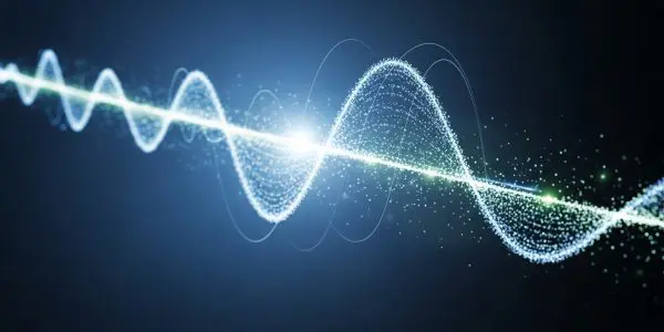 An abstract glowing blue particle waveform representing a quantum wave function on a dark background.