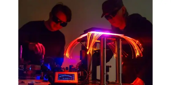 UbiQD researchers working on a single photon emitting quantum dot device supported