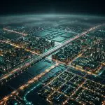 A circuit board lit like a city seen from the air