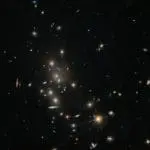 Visible & Infrared Light Reveal Galaxy Cluster MACS J1141 Details