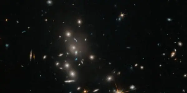 Visible & Infrared Light Reveal Galaxy Cluster MACS J1141 Details