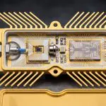 A gold hermetic package containing two photonic dies