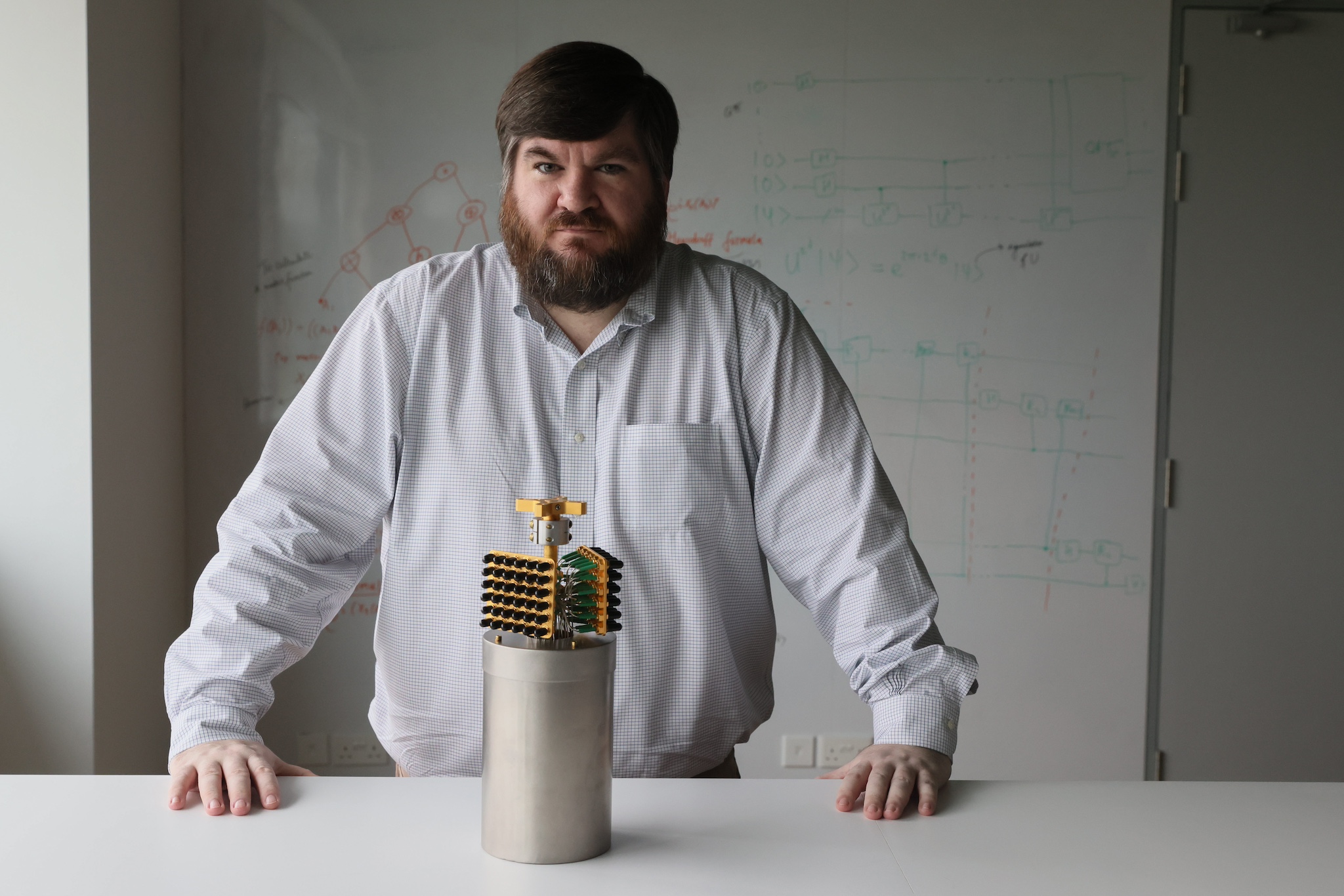 Horizon Quantum Computing chief executive Joe Fitzsimons with a Rigetti Novera quantum processor chip