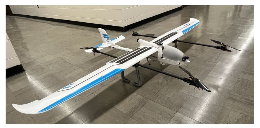 Quadplane Achieves Perception-Based Autonomous Landing in Unstructured Environments, Enabling Long-Range Missions