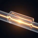 High-Temperature Operation Advances Lithium Niobate Waveguide Power Thresholds