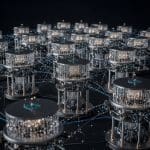 Distributed Variational Quantum Algorithm Achieves 1,000-Variable Combinatorial Optimisation Solutions